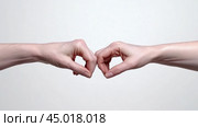 Two Hands Forming a Heart Shape Against a Neutral Background, AI. Стоковое AI-изображение, AI-художник Сергей Старуш / Фотобанк Лори