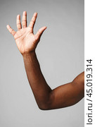 Mans Arm Raised in the Air. Стоковое фото, фотограф Сергей Толмачёв / Фотобанк Лори