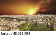 View of the modern houses Amman, Jordan, Middle East. Against the background of the sunset. Стоковое видео, видеограф Владимир Журавлев / Фотобанк Лори