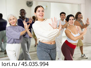 Group of people practicing energetic lindy hop movements. Стоковое фото, фотограф Яков Филимонов / Фотобанк Лори