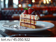 Slice of layered cake with strawberries and chocolate drizzle tempting diners in restaurant. Стоковое AI-изображение, AI-художник Иван Рябоконь / Фотобанк Лори