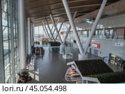 Inside of passenger terminal of Platov International Airport in Rostov-on-Don, Russia (2021 год). Редакционное фото, фотограф Elena Odareeva / Фотобанк Лори