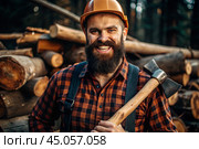 A lumberjack with an axe. The bearded woodcutter. We prepare firewood. Hiking in the forest. Forest care. A man in a plaid shirt uses an axe. A brutal male in the forest. Power and strength. Стоковое AI-изображение, AI-художник Photojuli / Фотобанк Лори