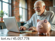 Pension. Saving money. Savings. Piggy bank in the form of a pig in close-up, Calculating the total amount of the budget. An elderly man learns how to interact with a laptop in online payments, finance, loans, transactions. Стоковое AI-изображение, AI-художник Photojuli / Фотобанк Лори