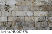 The texture of the stone wall. Стоковое фото, фотограф Семён Прудий / Фотобанк Лори