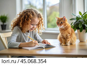 Education and training. A little curly-haired girl is doing her homework. The student does her schoolwork at home. A red-haired cat is sitting next to me. Стоковое AI-изображение, AI-художник Photojuli / Фотобанк Лори