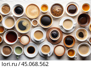 Lots of mugs of different coffee and coffee drinks on a white table. Top view, flat lay. Стоковое AI-изображение, AI-художник Photojuli / Фотобанк Лори