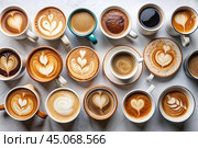 Lots of mugs of different coffee and coffee drinks on a white table. Top view, flat lay. Стоковое AI-изображение, AI-художник Photojuli / Фотобанк Лори
