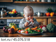 Healthy baby food. The first meal. Feeding the baby. A cute kid tastes fresh vegetables. Стоковое AI-изображение, AI-художник Photojuli / Фотобанк Лори