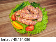 Мясопродукты. Полуфабрикаты. Мясо. Свинина. Говядина. Кухня. Ресторан. Кафе. Приготовление. Ужин. Стол. Стейк. Пища. Стоковое фото, фотограф Владимир Зыбин / Фотобанк Лори