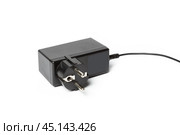 AC adapter isolated on white. Стоковое фото, фотограф Сергей Толмачёв / Фотобанк Лори