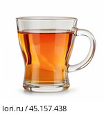 Clear glass cup containing hot tea with a teabag steeping inside. Стоковое AI-изображение, AI-художник Иван Рябоконь / Фотобанк Лори