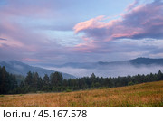 Туманный летний закат на Южном Урале. A misty summer sunset in the Southern Urals. Стоковое фото, фотограф Евгений Романов / Фотобанк Лори