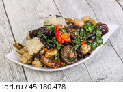 Pickled asian mushroom mux with herbs. Стоковое фото, фотограф Андрей Старостин / Фотобанк Лори