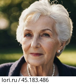 Sophisticated older French woman is in the open air. Demeanor reveals a lifetime of experiences and reflections, embodying grace and wisdom. Well-groomed woman 70 years old with grey hair. AI. Стоковое AI-изображение, AI-художник Юлия Петровская / Фотобанк Лори
