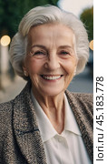 Sophisticated smiling older French woman in the open air. Demeanor reveals a lifetime of experiences and reflections, embodying grace and wisdom. Well-groomed woman 70 years old with grey hair. AI. Стоковое AI-изображение, AI-художник Юлия Петровская / Фотобанк Лори