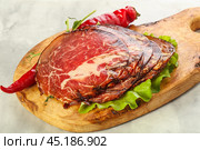 Dried pork neck meat snack. Стоковое фото, фотограф Андрей Старостин / Фотобанк Лори