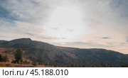Mountain lake time lapse in summer or autumn. Wild nature and beautiful sunset. Moving clouds, deep twilight and dramatic sky. Стоковое видео, видеограф Александр Маркин / Фотобанк Лори