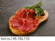 Italian cuisine - bresaola di Milano. Стоковое фото, фотограф Андрей Старостин / Фотобанк Лори