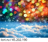 Sparkling fallen snow against the background of multi-colored lights. Festive atmosphere of the New Year. New Year's background for creativity. Стоковое AI-изображение, AI-художник Сергей Елизарьев / Фотобанк Лори