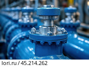A large industrial component, part of a piping system or pumping equipment. The central place is occupied by a metal valve or flange joint in blue with bolts, creating a sense of strength and engineering precision. The component looks new and neat, which indicates high quality of workmanship and maintenance. The photo conveys the atmosphere of a technical facility, probably a manufacturing or energy enterprise, focusing on the details of the equipment. Стоковое AI-изображение, AI-художник Анна Кривицкая / Фотобанк Лори