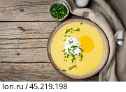 Polenta, porridge with Parmesan cheese and poached egg, Стоковое фото, фотограф Natalia Gdovskaia / Фотобанк Лори