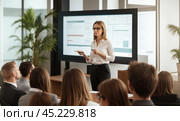 Confident lady business trainer coach leader give flip chart presentation consulting clients teaching employees training team people speaking explaining strategy at marketing workshop concept. Стоковое AI-изображение, AI-художник Павел Муравьев / Фотобанк Лори