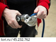 Crimper for crimping wires.A professional tool for compressing large diameter wires. Стоковое фото, фотограф Александр Поташев / Фотобанк Лори