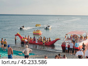 Черное море,    пляж, Краснодарский край, Туапсинский район, Бухта Михайловская водные развлечения (2024 год). Стоковое фото, фотограф Александр Циликин / Фотобанк Лори