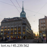 Evening view of the Esders and Scheefhals building in Saint Petersburg (2024 год). Редакционное фото, фотограф Евгений Харитонов / Фотобанк Лори