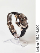 Munich, Swiss - 24 oct 2024: swiss wrist watch Ulysse Nardin SONATA Cathedral, close-up 3d. Silver wristband and bright steel dial, tachymeter, chronograph. Luxury watches concept. Copy ad text space. Редакционное фото, фотограф Aleksandr Golubev / Фотобанк Лори
