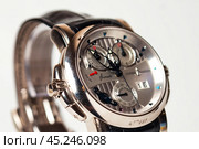 Munich, Swiss - 24 oct 2024: swiss wrist watch Ulysse Nardin SONATA Cathedral, close-up 3d. Silver wristband and bright steel dial, tachymeter, chronograph. Luxury watches concept. Copy ad text space. Редакционное фото, фотограф Aleksandr Golubev / Фотобанк Лори
