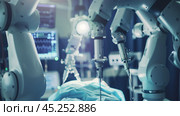 Automated Robot Arms Operating Patient In High-Tech Hospital. Стоковое AI-изображение, AI-художник Решат Алиев / Фотобанк Лори
