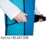 Рентгеновский защитный фартук. Вид сбоку. На белом фоне. Стоковое фото, фотограф Александр Рыбалка / Фотобанк Лори