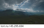 Mountain landscape with sun rays. Стоковое видео, видеограф Михаил Коханчиков / Фотобанк Лори