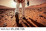 Astronaut on Mars surface, red planet rocks underfoot, sun illuminates landscape, space exploration achievement. Стоковое AI-изображение, AI-художник Павел Муравьев / Фотобанк Лори