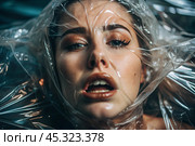 The girl is wrapped in cellophane or a bag. The girl is suffocating. Plastic pollution of the planet. Environmental hazard. Reducing the reuse of plastic. Recycling. The concept of garbage. Стоковое AI-изображение, AI-художник Photojuli / Фотобанк Лори