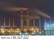 Трубы одной из Московских ТЭЦ морозным вечером (2019 год). Стоковое фото, фотограф YuryKara / Фотобанк Лори