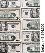 Close-up of paper American dollar bills. Dollar bills of 20 dollars lie on the table. Money financial background. Flat lay, close-up, top view. Стоковое фото, фотограф Виктория Катьянова / Фотобанк Лори