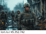 A soldier in full combat gear walking through a devastated area. His face shows dirt and signs of fatigue. The soldier is dressed in camouflage uniform and helmet, with combat gear strapped to his chest. Other soldiers are visible in the distance, adding to the sense of a collective advance through a combat zone. The atmosphere is tense, with the gray background adding to the gloomy mood. Стоковое AI-изображение, AI-художник Анна Кривицкая / Фотобанк Лори