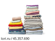 stack of clothing isolated on white. Стоковое фото, фотограф Сергей Толмачёв / Фотобанк Лори