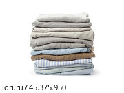 stack of clothing isolated on white. Стоковое фото, фотограф Сергей Толмачёв / Фотобанк Лори