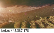 Low altitude flight over fresh fast mountain river with rocks at sunny summer morning. Стоковое видео, видеограф Александр Маркин / Фотобанк Лори