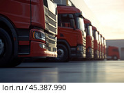 Red trucks parked at a bustling logistics hub area in a row. Lineup of several trucks in the truck parking fully prepared, ready for deliveries. Van transportation truck park. Warehouse distribution. Стоковое AI-изображение, AI-художник Марина Демидюк / Фотобанк Лори
