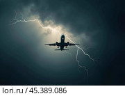 The aircraft encounters a severe thunderstorm, surrounded by dark clouds and illuminated by bright lightning strikes, highlighting the danger in the sky. Causes of air crashes. Generative AI. Стоковое AI-изображение, AI-художник Юлия Петровская / Фотобанк Лори