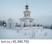 White Chapel  in the winter twilight. Cherdyn. (2024 год). Стоковое фото, фотограф Саблин Станислав / Фотобанк Лори