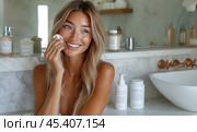 A blonde woman looks in the mirror with a smile that radiates confidence. Created by AI. Стоковое AI-изображение, AI-художник Ярославский Максим / Фотобанк Лори