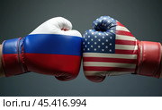 Боксерские перчатки в цветах флагов России и США. Концепция противостояния государств. Стоковое AI-изображение, AI-художник Илья Старков / Фотобанк Лори