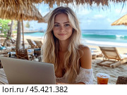 A girl in a light summer dress sits at a table in a cafe, sheltered from the scorching sun by a beach umbrella. Created by AI. Стоковое AI-изображение, AI-художник Ярославский Максим / Фотобанк Лори