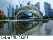 Esplanade theatres reflecting in water feature singapore. Стоковое AI-изображение, AI-художник Иван Рябоконь / Фотобанк Лори